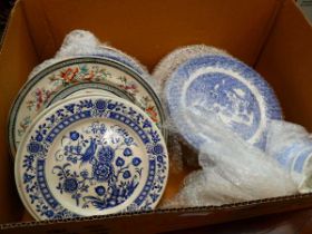Box containing blue and white and other ironstone crockery