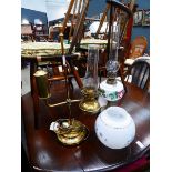 2 x brass and floral patterned oil lamps One converted