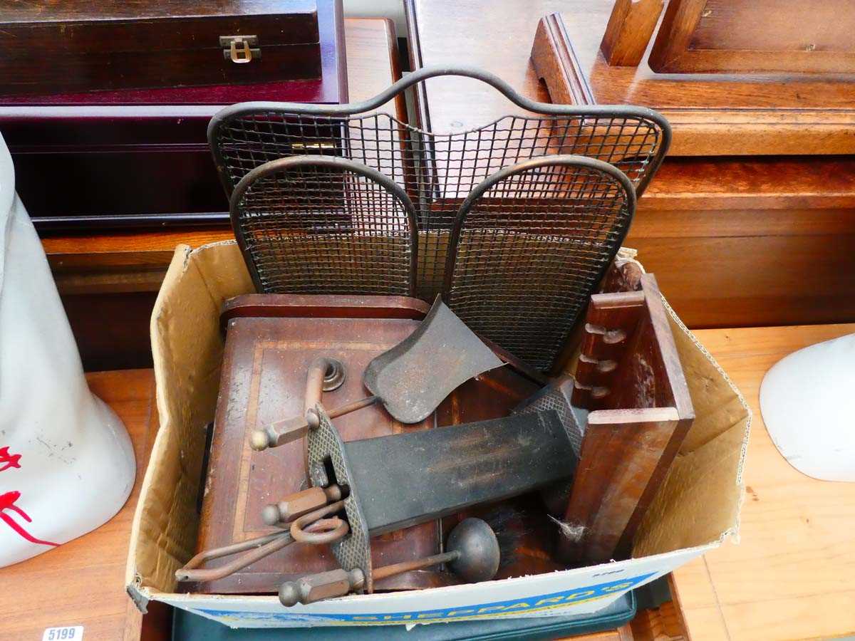 Box containing a mesh spark guard, coal scuttle and companion set