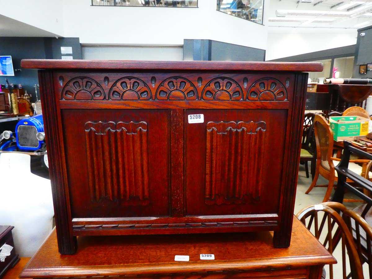 Oak coffer with linen fold panels