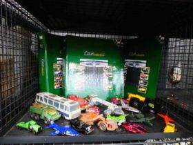 Cage containing car collection magazines and a quantity of playworn die cast vehicles