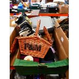 Box containing loose cutlery, radio, books and wicker basket