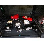 Cage containing quantity of Burago cars