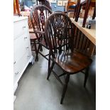 Six oak wheel back dining chairs