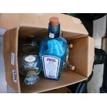 Box containing empty alcohol bottles