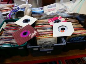 3 boxes containing 7" vinyl records