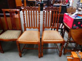 Pair of oak barley twist dining chairs with drop in seat