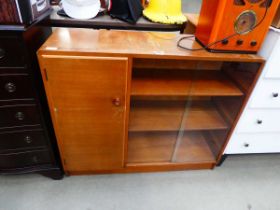 Teak cupboard with bookcase and sliding doors to the side