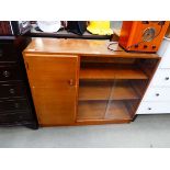 Teak cupboard with bookcase and sliding doors to the side