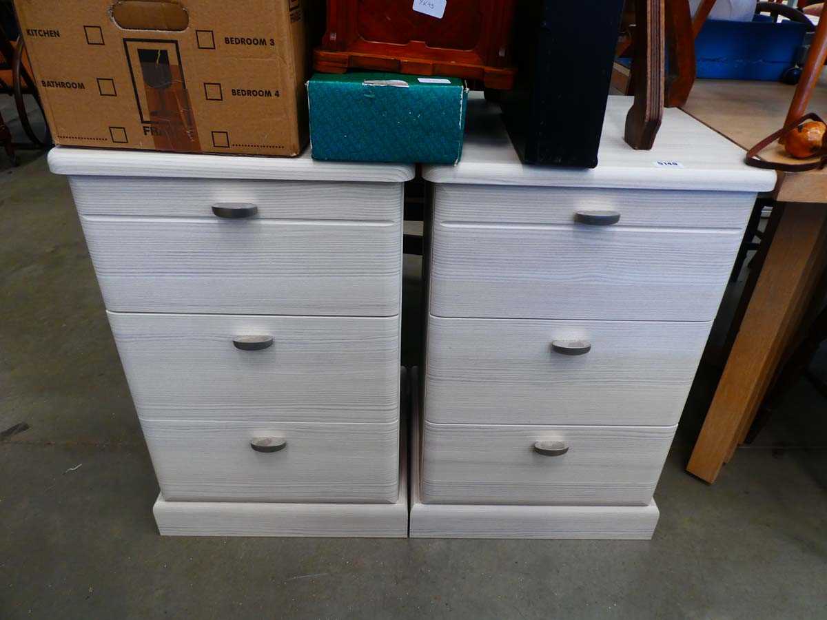 Pair of modern lime washed three drawer bedside cabinets