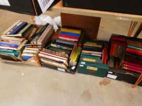 4 boxes containing art and antique reference books plus books on wood turning and novels