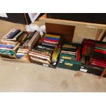 4 boxes containing art and antique reference books plus books on wood turning and novels