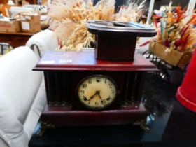 Mantel clock with columns to the side plus one other