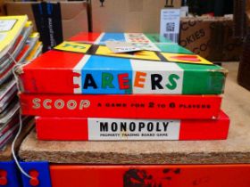 3 board games inc. Monopoly, Careers and Scoop