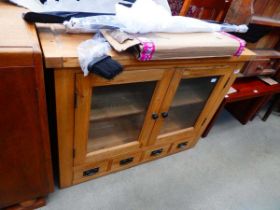 Glazed oak double door cupboard with 4 drawers under