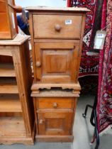 Pair of single door bedside cabinets with drawer over