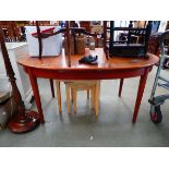 Teak extending dining table