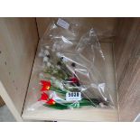 Bag containing Murano glass flowers