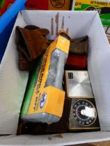 Box containing pipes, gloves, camera and a transistor radio