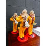 4 x papier mâché figures with egg timers One missing