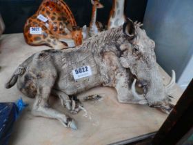 Pottery figure of a warthog Damage to ear