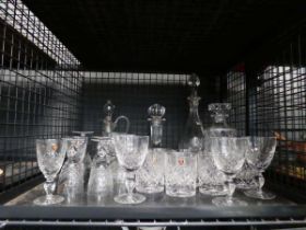 Cage containing quantity of Watford crystal tumblers, wine glasses and decanters