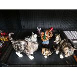 Cage of Winstanley cats plus Royal Doulton figure of carpet seller