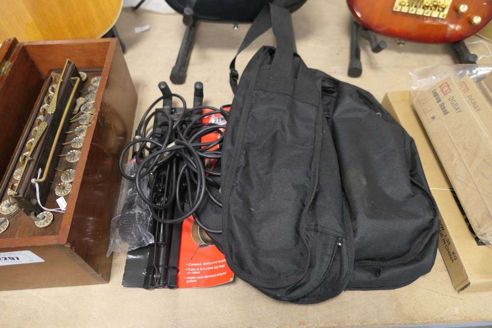 Quantity of items, to include guitar stand, microphone and guitar soft case