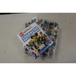 Large quantity of collectable Lego characters and Lego Character Encyclopaedia