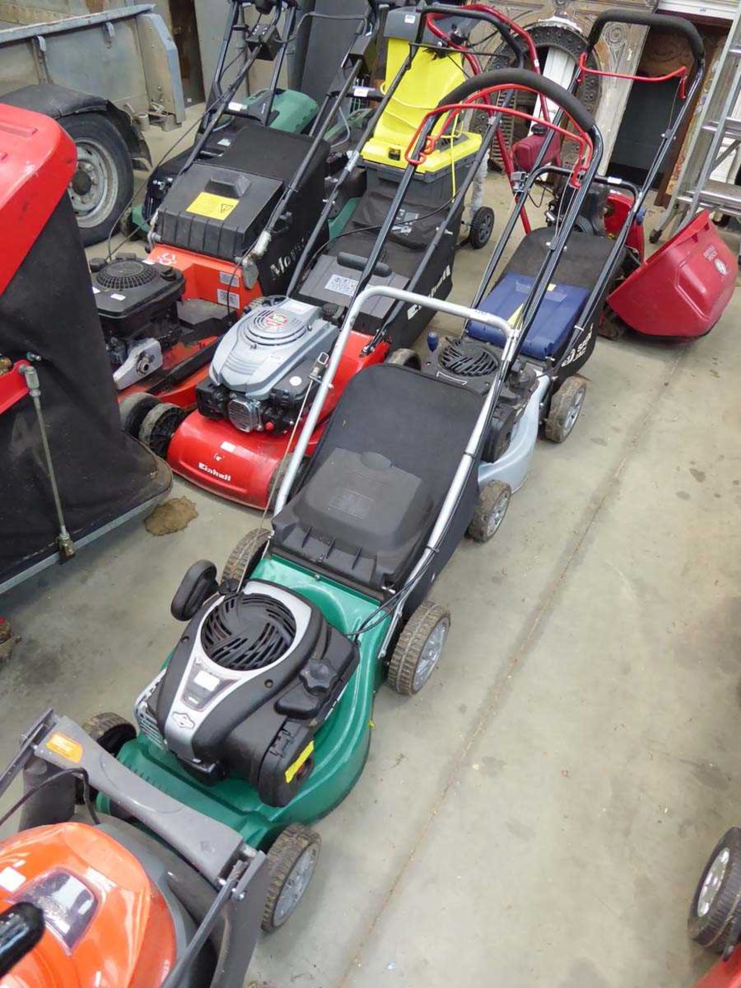 Qualcast green petrol powered rotary mower with grass box