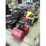 Red Suffolk Punch petrol powered cylinder mower with grass box