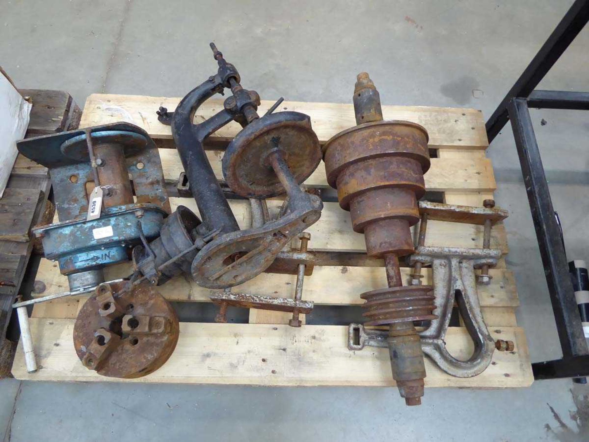 Pallet of assorted engineering items inc. 3-jaw chuck, pair of machine steadies and other items