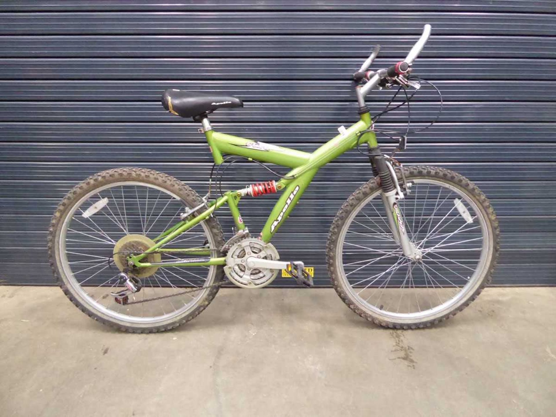 Apollo Guru child's green mountain bike