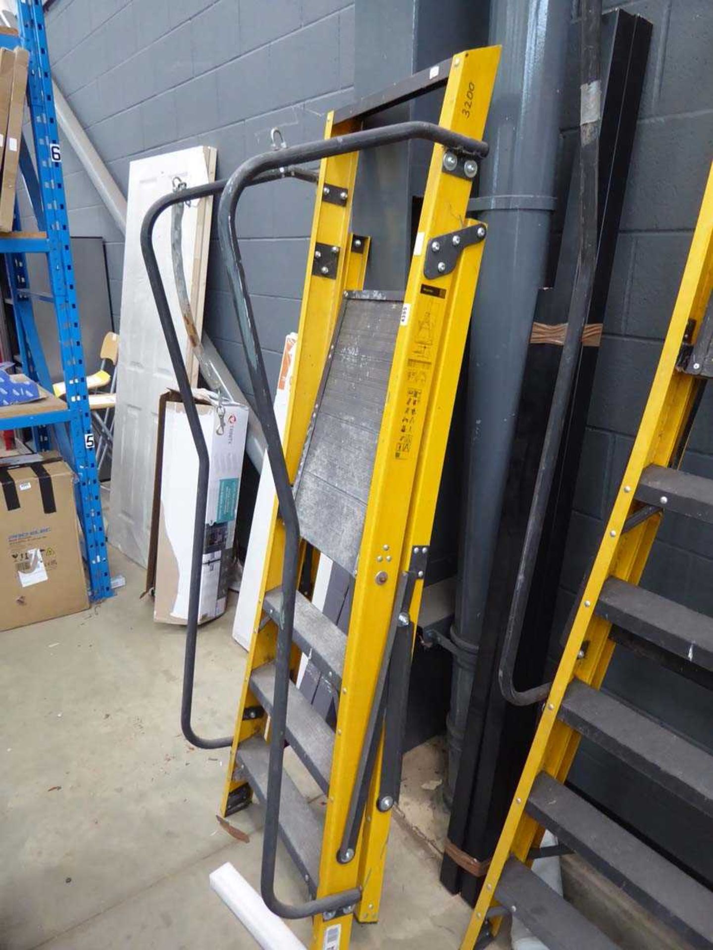 4 tread yellow and black step ladder