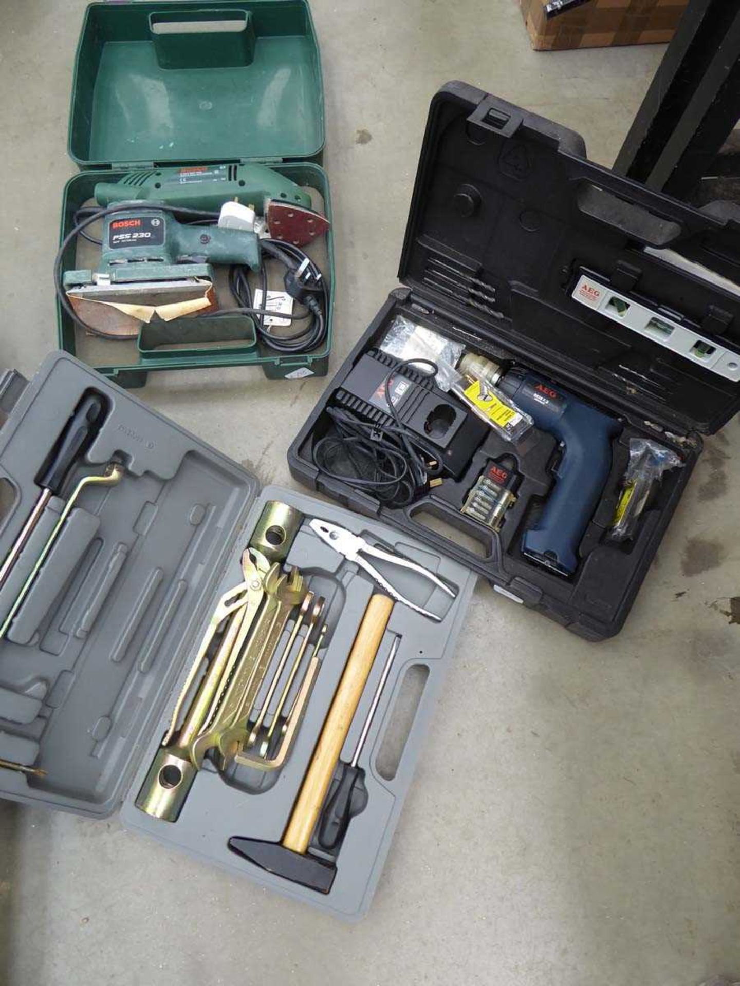 3 x boxes containing a cylinder, AEG drill and Iveco tool kit