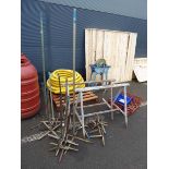 2 metal trestles and quantity of stands and hooks