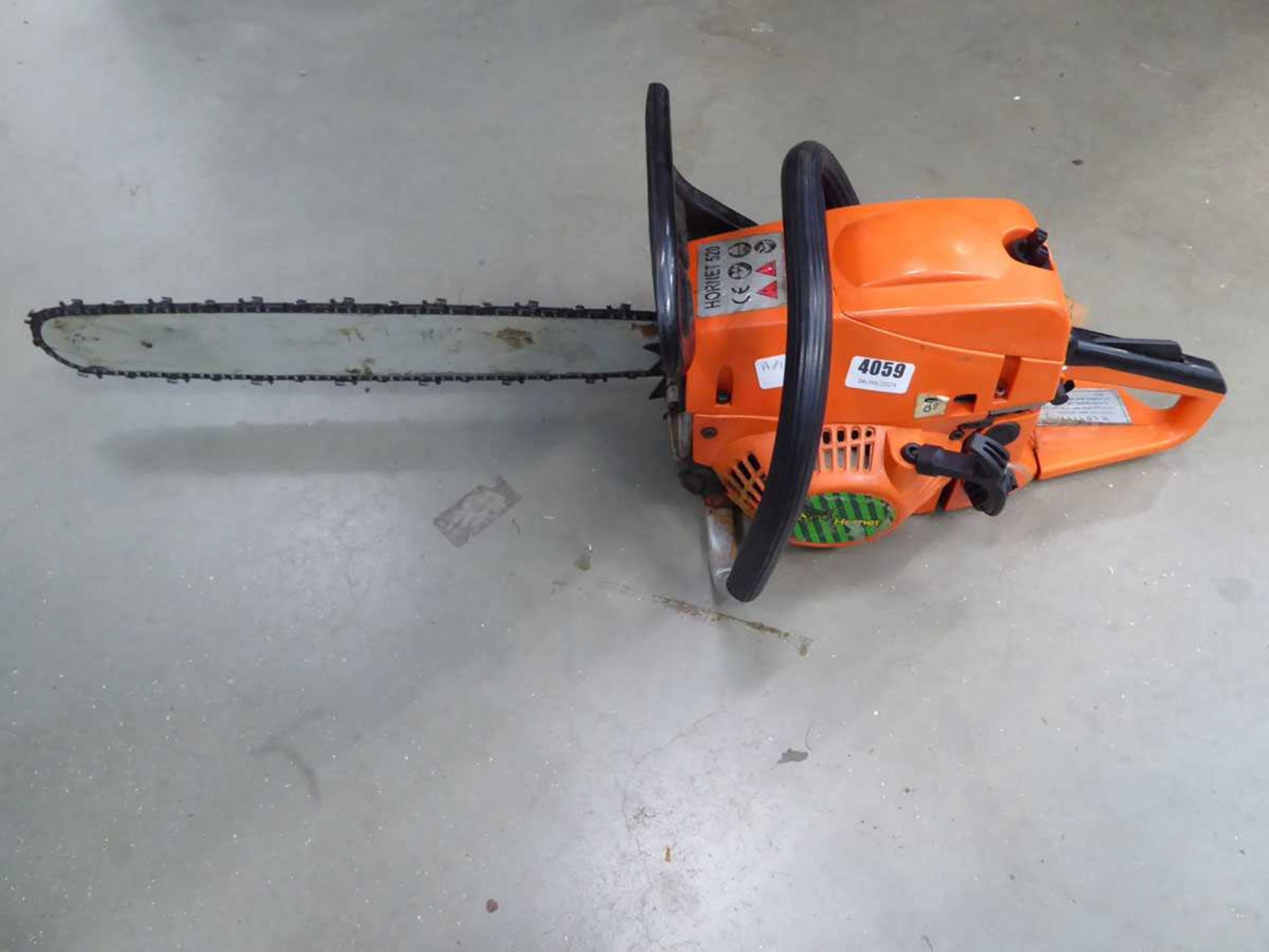 Hornet orange petrol powered chainsaw
