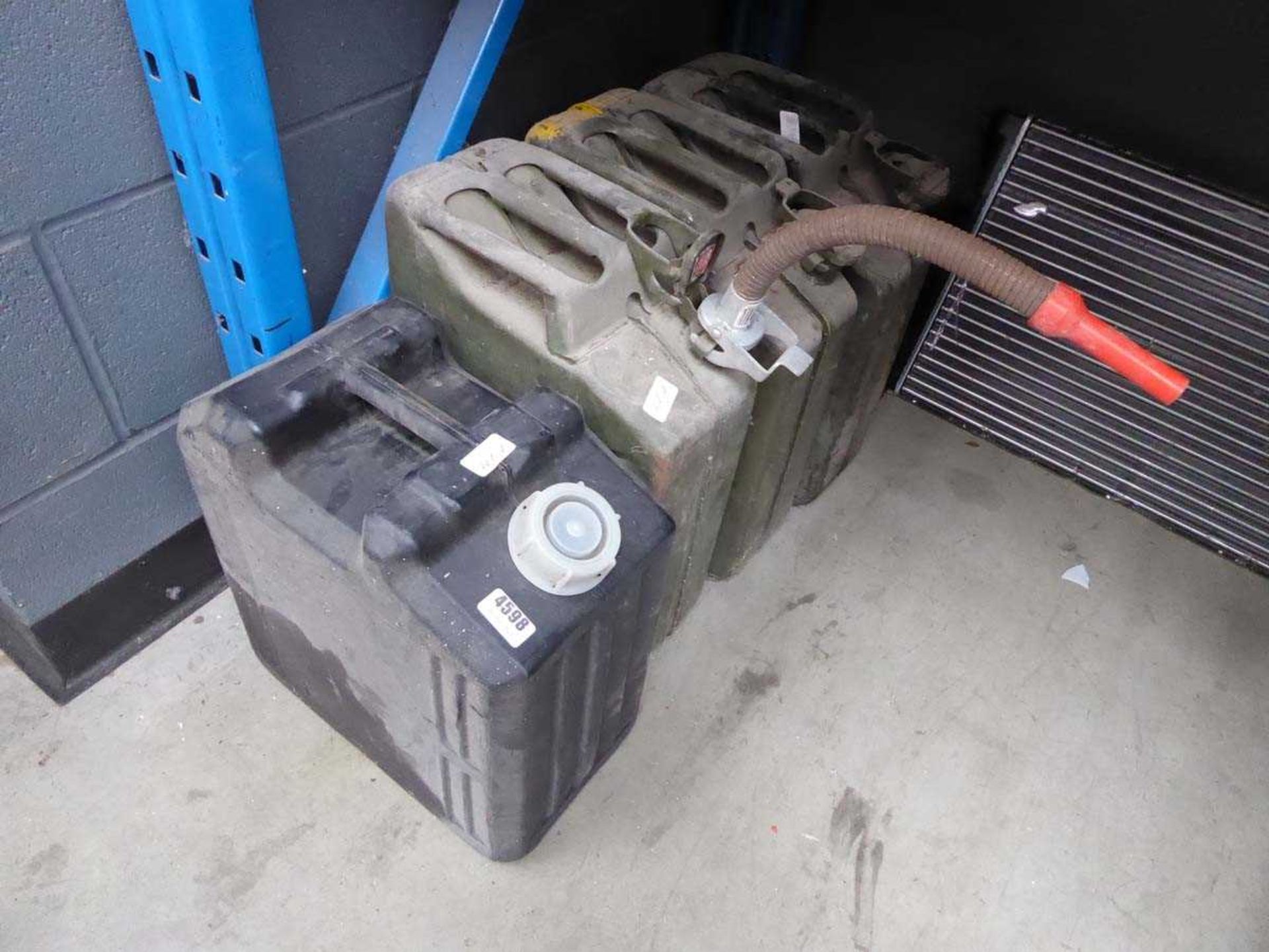 3 x metal jerry cans and a metal jerry can