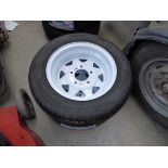 2 white trailer wheels with tyres