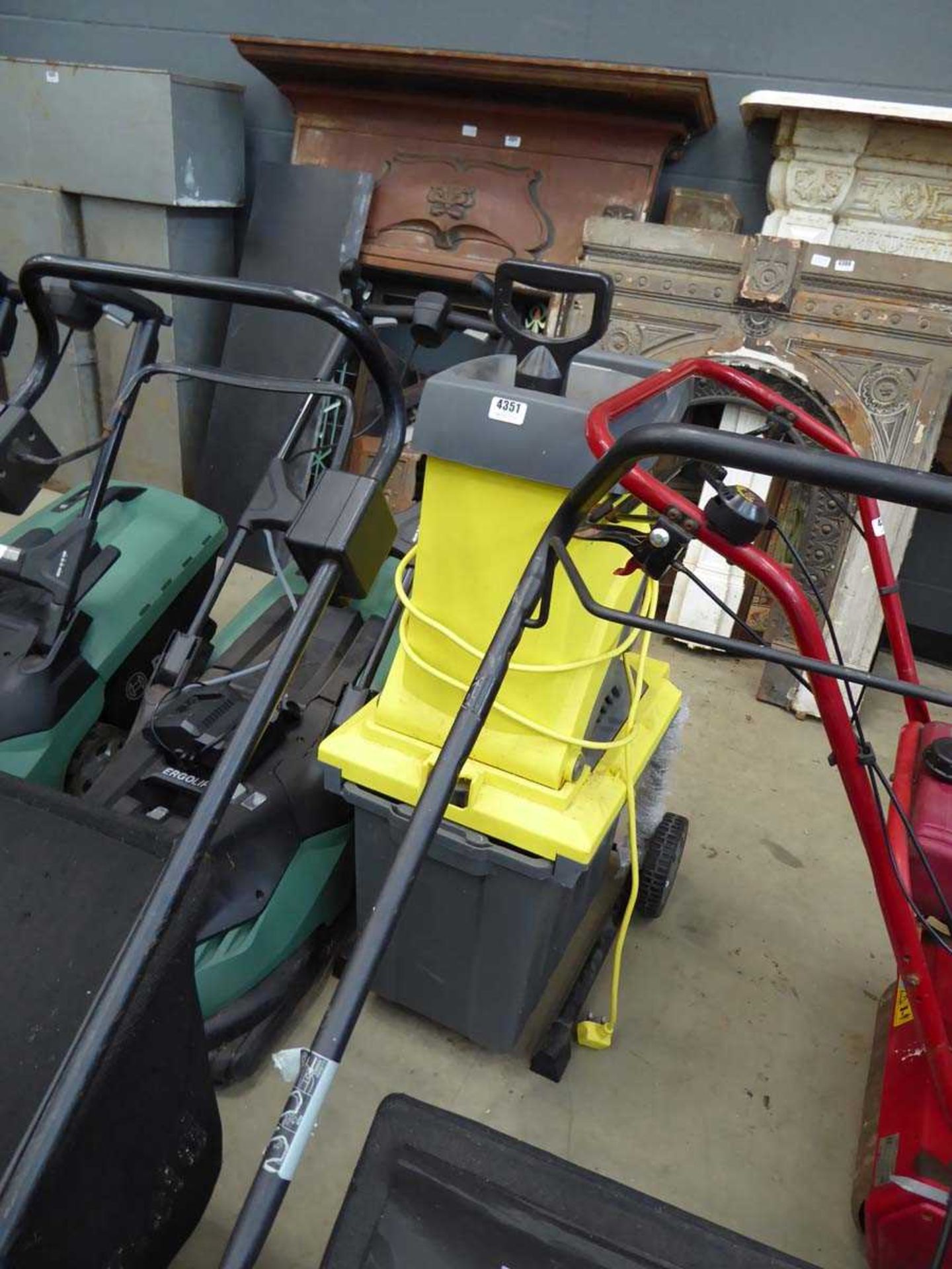 Yellow electric garden shredder