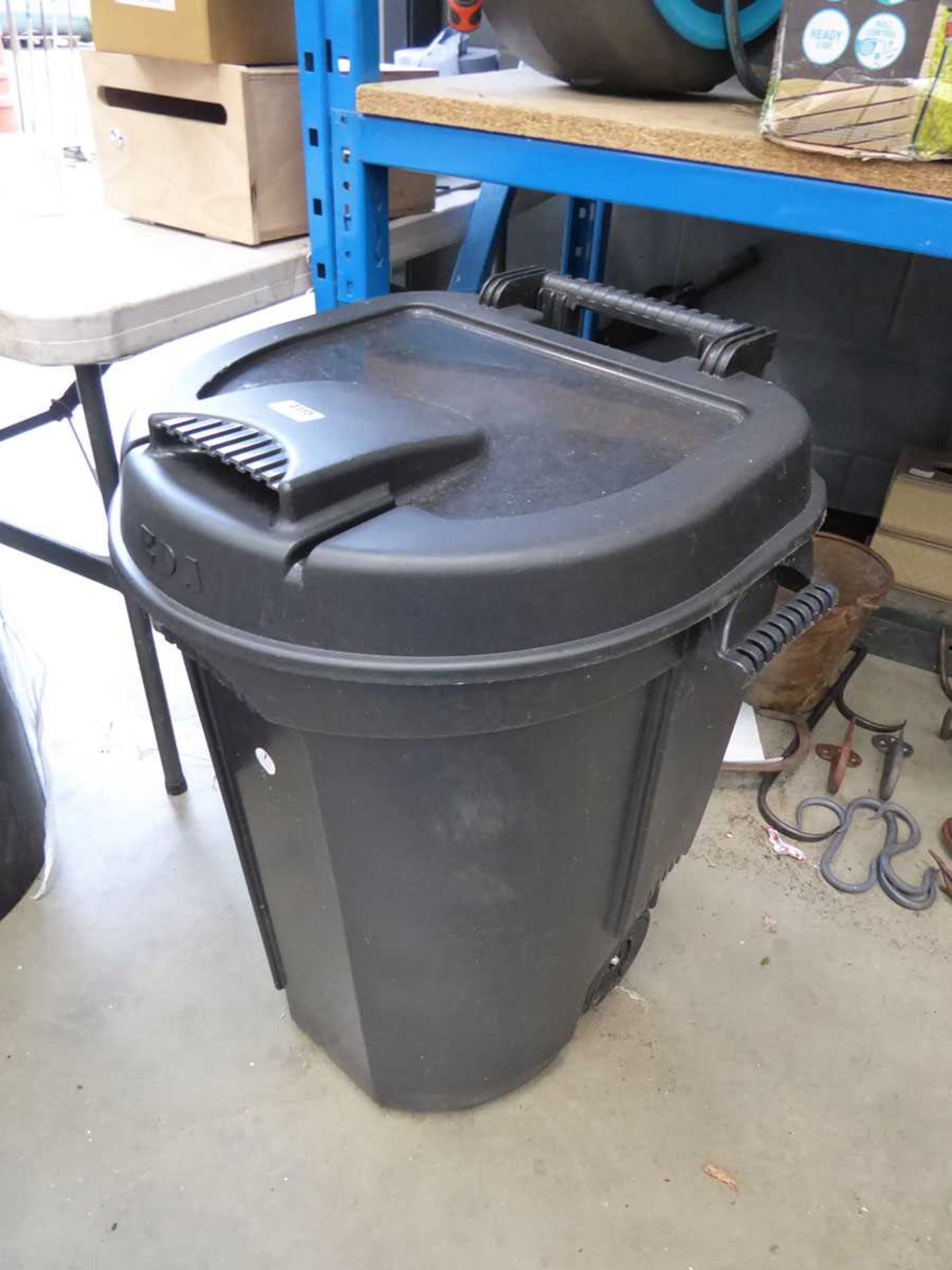 Small wheeled rubbish bin