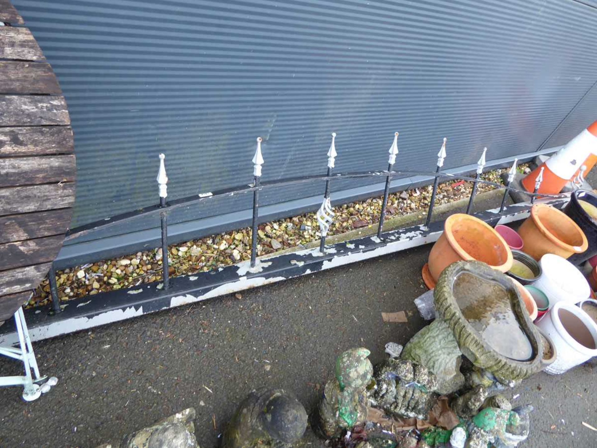 Large heavy duty metal wall topped railing
