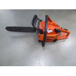 Orange Sachs Dolmar petrol powered chainsaw
