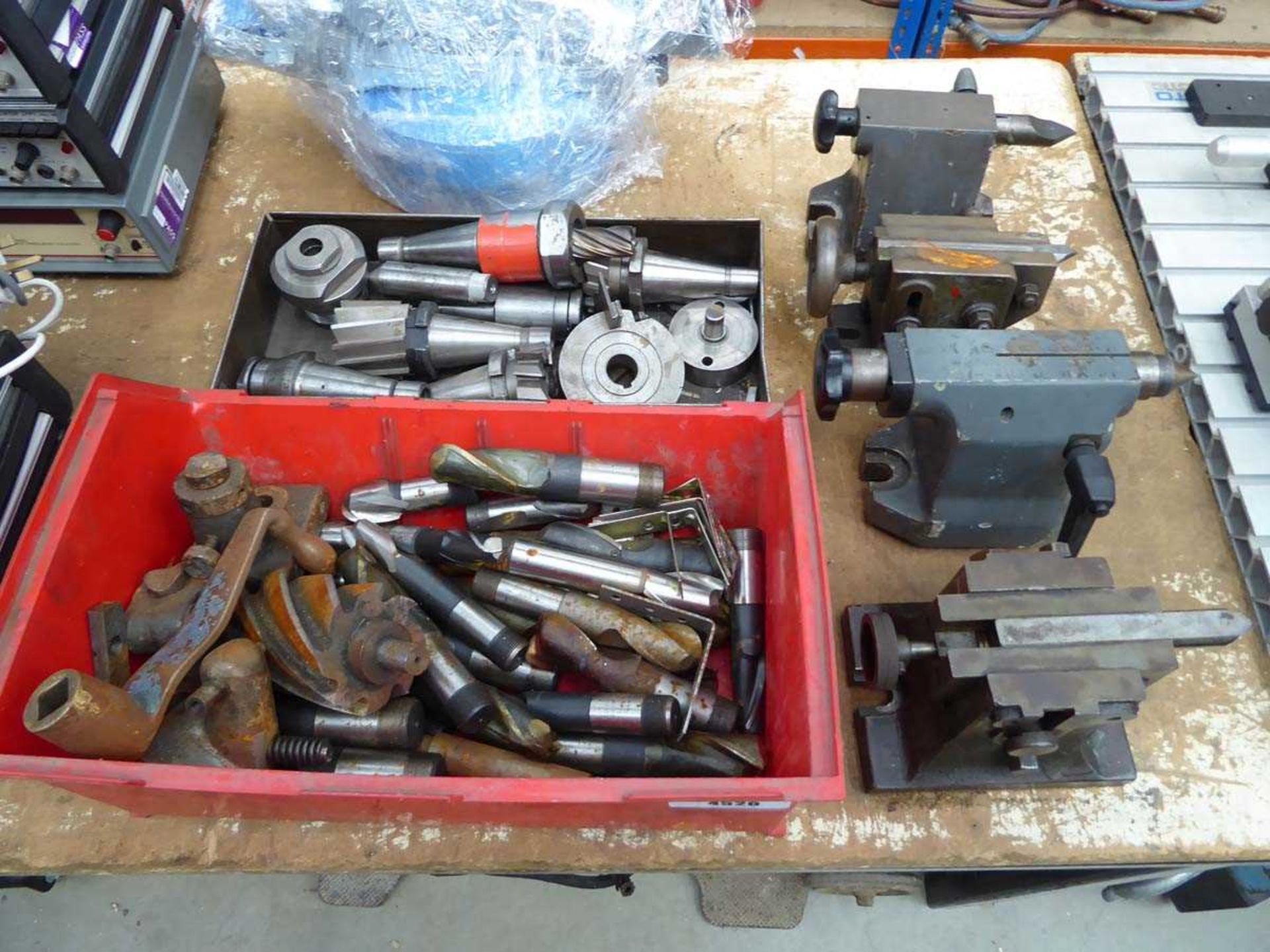 +VAT 4 lathe machine tail stocks and 2 trays of various large drill bits, reamers, and machine