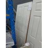 2 white 4 panel internal doors