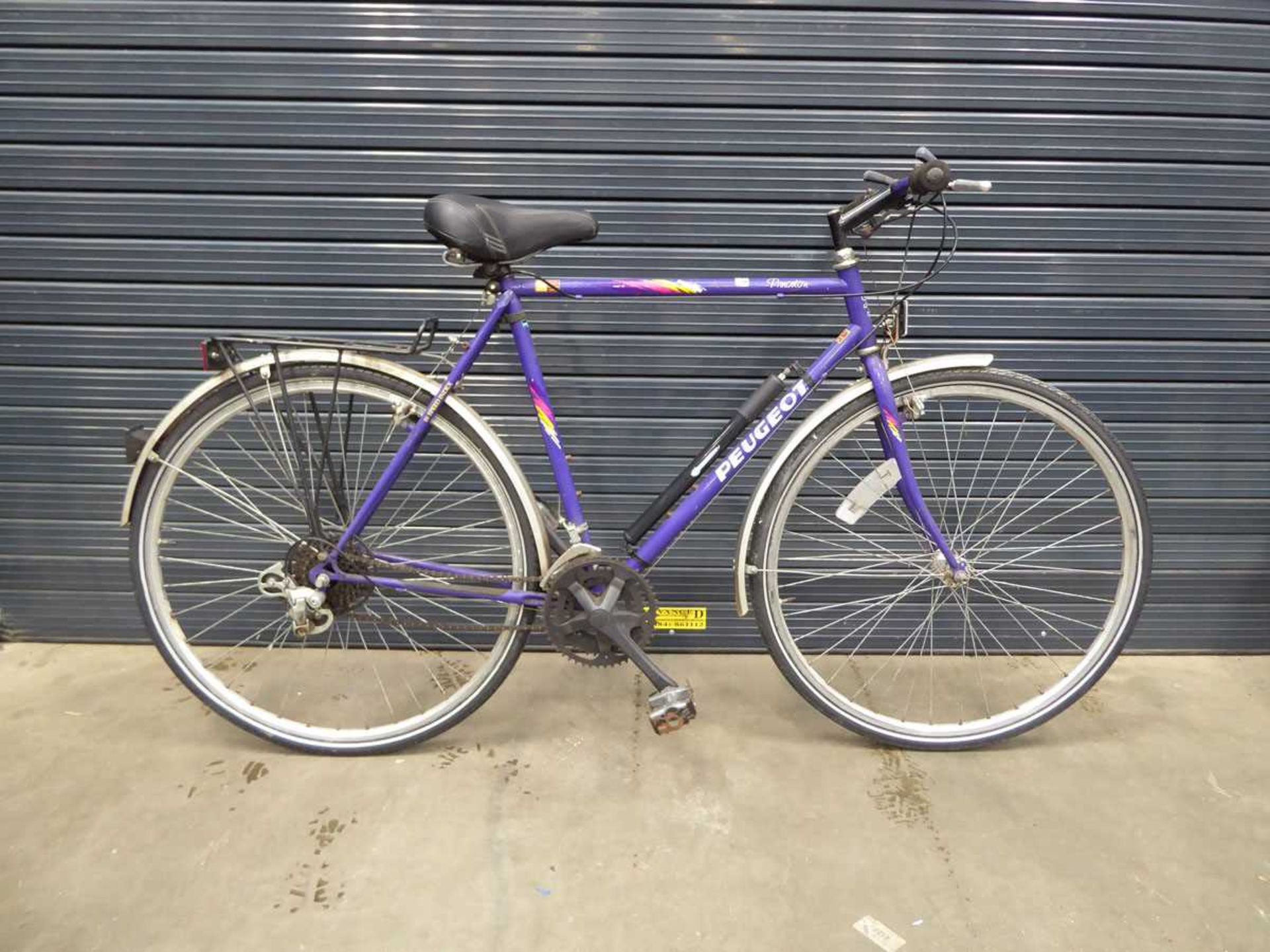 Purple Peugeot gent's bike with back rack