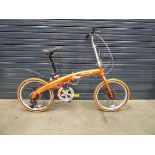 Greenway orange foldup bike