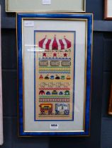 Framed & glazed circus embroidery