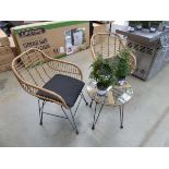 Small round glass topped rattan style table with 2 chairs