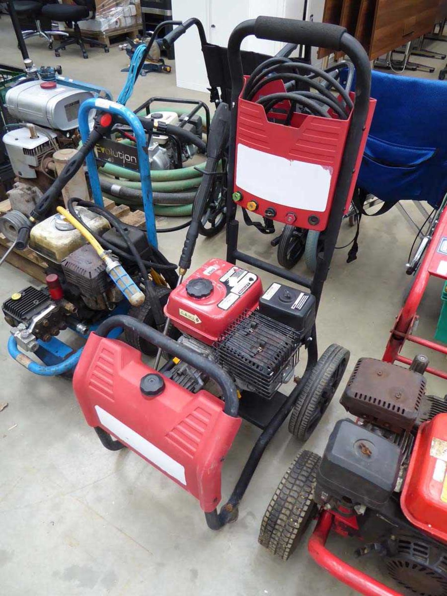 Red petrol powered pressure washer (no hose and lance)